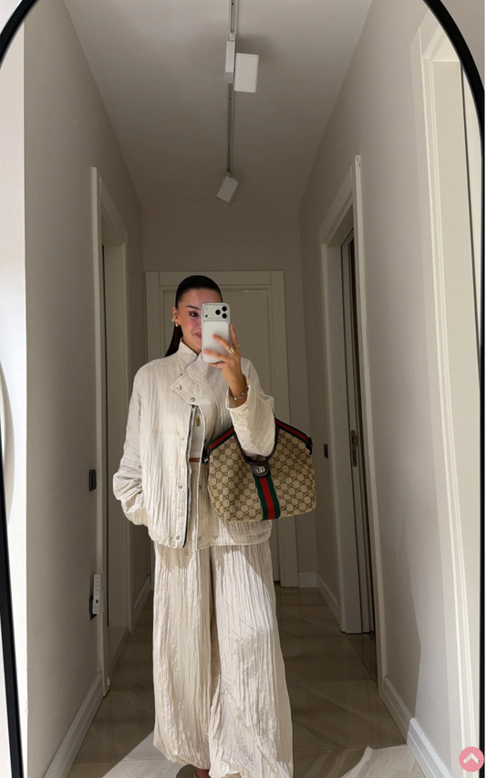Set off white pleated